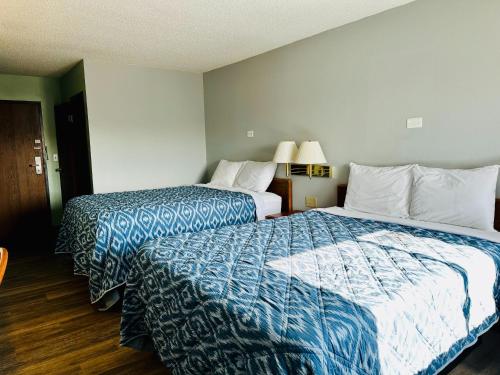 American Inn Ozarkにあるベッド