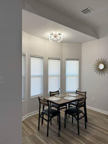 a dining room with a table and chairs at Gotravel in Cut and Shoot