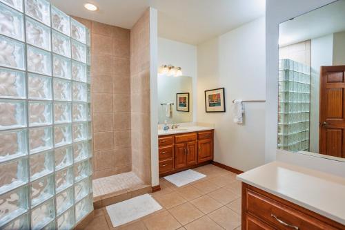 a large bathroom with a sink and a shower at Bluff Haven by Simple Life Rentals in Fish Creek