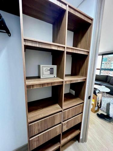 TV a/nebo společenská místnost v ubytování Apartamentos en Laureles Medellin con Aire Acondicionado
