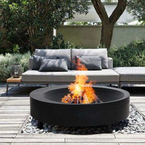 a fire pit in the middle of a patio at Sluneční villa Terezka Lednice ,penzion pro skupiny se snídaní,degustací vín in Lednice