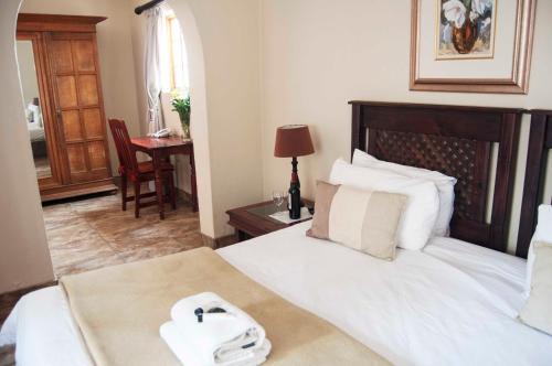 Letto o letti in una camera di Brooklyn Guesthouses