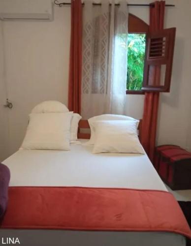 Ένα ή περισσότερα κρεβάτια σε δωμάτιο στο Appartement cosy à Le Morne-des-Esses, 37 m², piscine