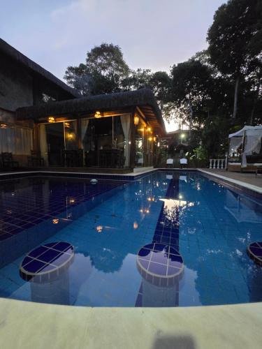 Kolam renang di atau dekat dengan Pousada Casa de Sapê