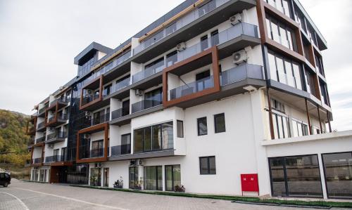 an apartment building with a lot of windows at Konstantins Apartment in Ohrid