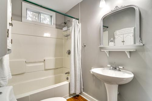 a white bathroom with a sink and a mirror at Ski, Hike and Fish Dog-Friendly Gem in Conway in North Conway