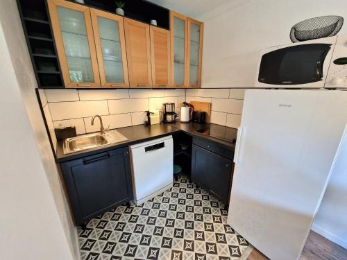 Photo de la galerie de l'établissement Charmant duplex à Modane, 3 chambres, 6-8 pers, skis aux pieds, proche station et commerces - FR-1-265-326, à Modane