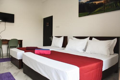 Cama o camas de una habitación en Solid Hotel Boralasgamuwa