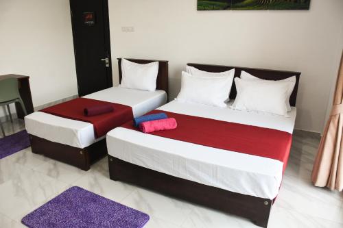 Cama o camas de una habitación en Solid Hotel Boralasgamuwa