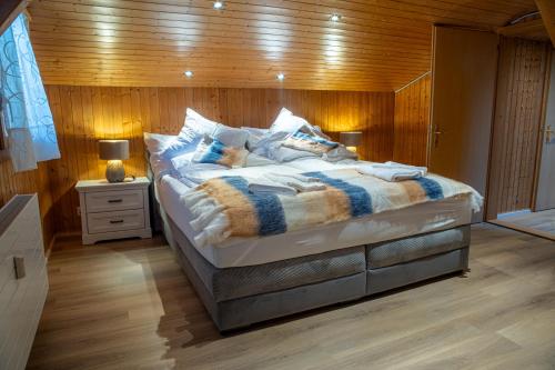 Postel nebo postele na pokoji v ubytování Chalet Santa Maria