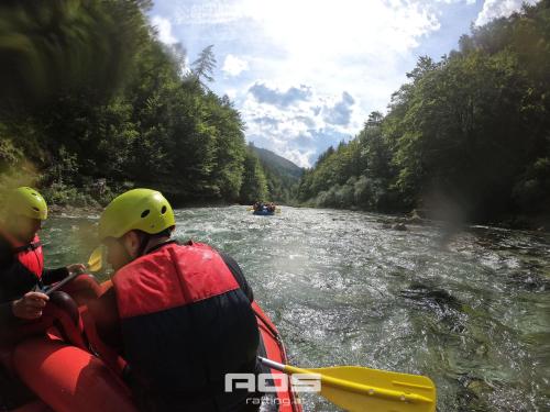 two people in a raft on a river at Eisenerzer Apartments - Radmeisterhaus in Eisenerz