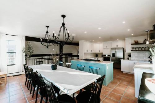 a kitchen with a table and chairs in a room at BEST VIEWS in Albuquerque with hot tub and pool in Albuquerque