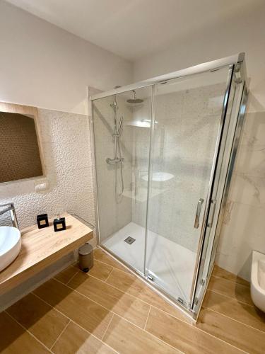 a bathroom with a shower and a sink at Miele B&B in Vinchiaturo