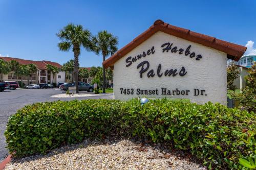 a sign for a spencer morgue palaume at Sunset Harbor Palms 1-308 in Navarre