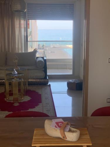 Posezení v ubytování Confort et Vue Mer Appartement avec Piscine