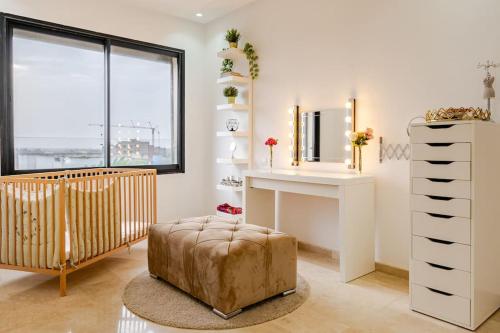 Katil atau katil-katil dalam bilik di Appartement Spacieux Près d'Aqua Parc Tamaris