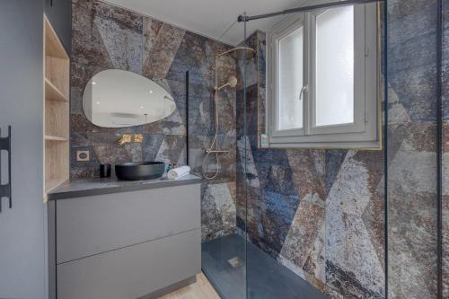a bathroom with a sink and a shower at #HE The Golden Escape Ile Verte luminous renovated in Grenoble