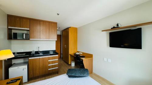 Køkken eller tekøkken på Flat aconchegante 5 andar