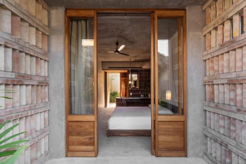 Hotel Humano, a Member of Design Hotelsにあるベッド