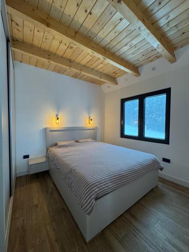 Postel nebo postele na pokoji v ubytování Vamas Villa