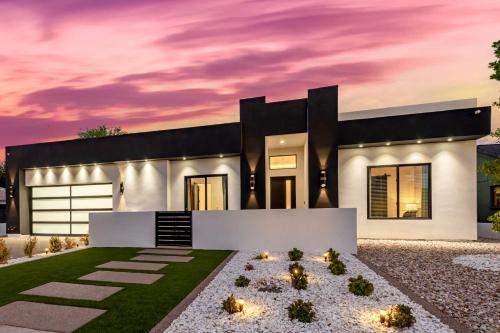 a rendering of a house with a sunset at The Carlisle Luxe Villa in Scottsdale