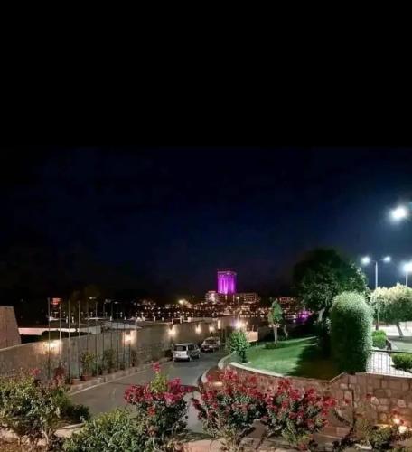 a view of the city at night at Happy house Aswan in Aswan