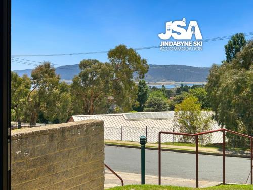 a sign that reads inclusivekritreservedkritisationheastheastheastheastheastheast at Tanderra 4 in Jindabyne