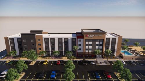 a rendering of a hotel with cars parked in a parking lot at Candlewood Suites Mesa - Phoenix East by IHG in Mesa
