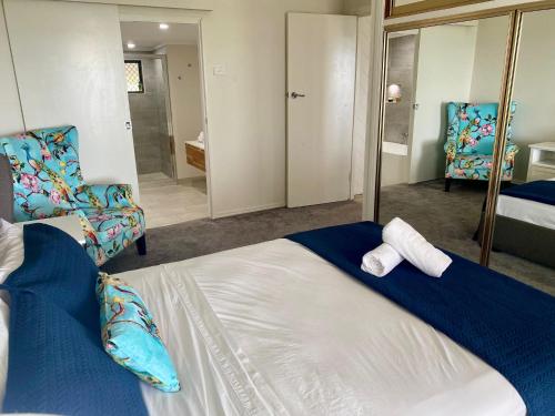 Katil atau katil-katil dalam bilik di Saunders Beach Holiday House