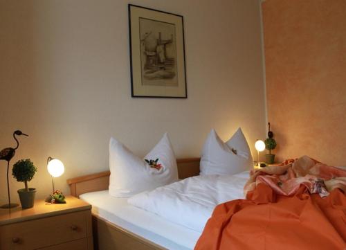 Ένα ή περισσότερα κρεβάτια σε δωμάτιο στο Hotel Grüner Baum