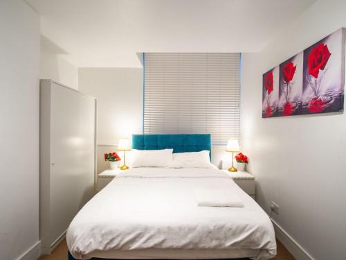 Postel nebo postele na pokoji v ubytování Modern 2 Bedroom Apartment in Woolwich