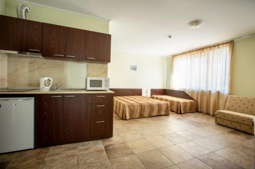 Kuchyň nebo kuchyňský kout v ubytování Family hotel Apolon