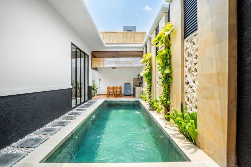 an indoor pool in a house at Kamaratih Villas by Maheswara in Legian