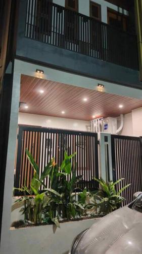 a balcony with plants on the side of a building at Staycation San Jose Del Monte City in Santo Cristo