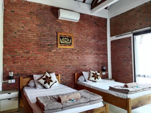 Ảnh trong thư viện ảnh của Rumah Pantai Krui ở Wainapal