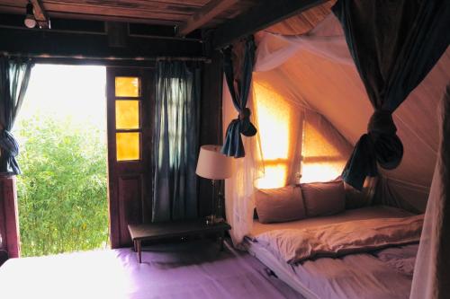 Postel nebo postele na pokoji v ubytování Chapi Dreamy Home