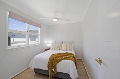 Ένα ή περισσότερα κρεβάτια σε δωμάτιο στο Frangipani Hideaway