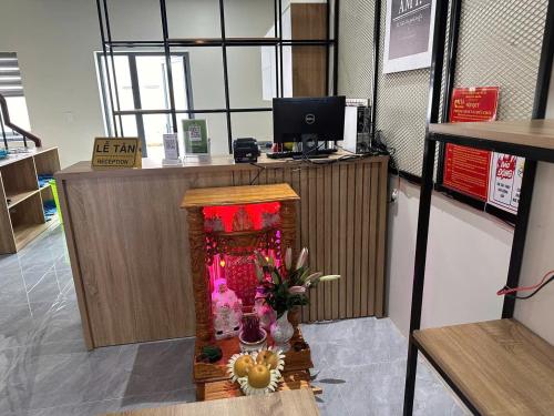an office with a desk with a computer on top at The Vista Châu Đốc Hotel in Chau Doc