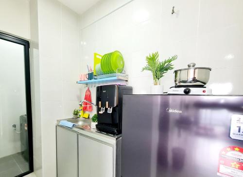 Η κουζίνα ή μικρή κουζίνα στο VIM Desa Park North ISP School Menjalara One Utama Ikea Kota Damansara KL