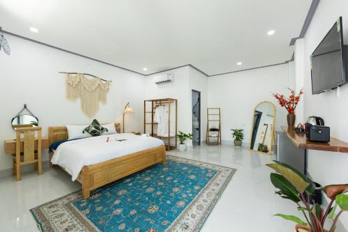 Postel nebo postele na pokoji v ubytování Cỏ Hai Lá Homestay