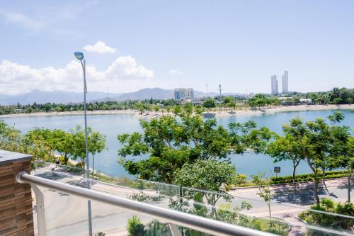 a view of a river from a balcony at Glamour Boutique Hotel in Phan Rang