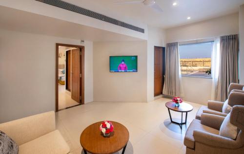 Un lugar para sentarse en Lords Inn Jamnagar -Motikhavdi