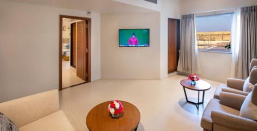Un lugar para sentarse en Lords Inn Jamnagar -Motikhavdi