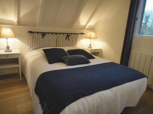 Llit o llits en una habitació de La Petite Chaumière