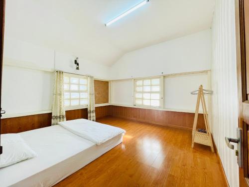 Ένα ή περισσότερα κρεβάτια σε δωμάτιο στο MiUon House 2