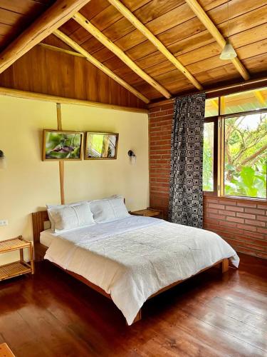 Katil atau katil-katil dalam bilik di Bird Lover's House