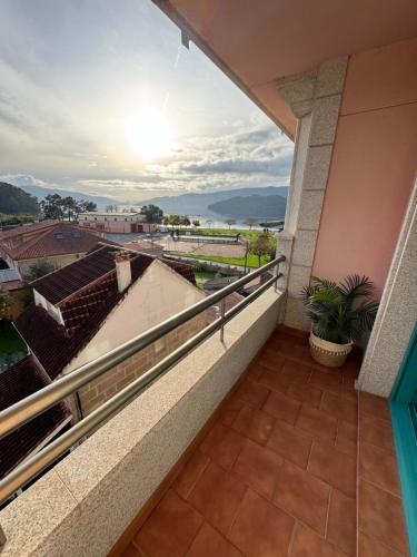 a balcony with a view of the ocean at Rincon Azul in Arcade