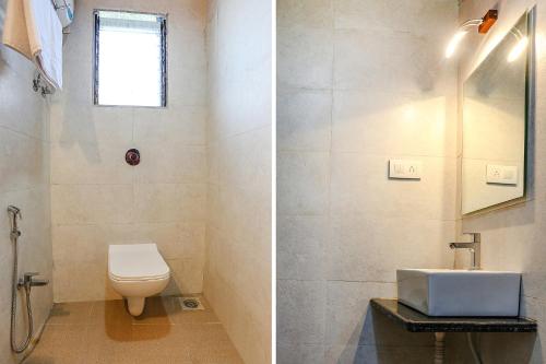 a bathroom with a toilet and a sink at FabExpress Geet Residency in Mumbai