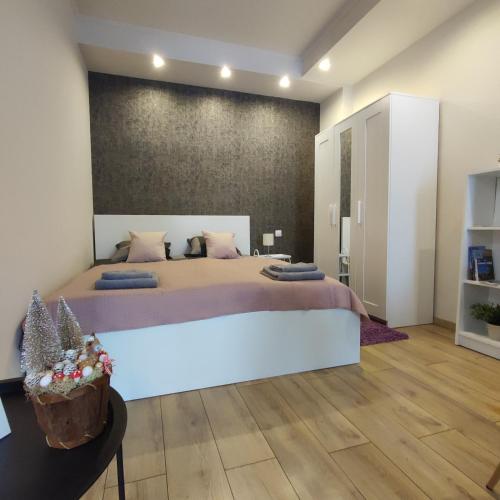 Postel nebo postele na pokoji v ubytování BOBANO Apartman