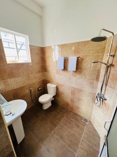 Salle de bains dans l'établissement JO Residence - Tangalle